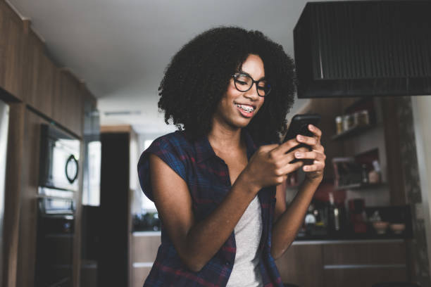 istock Teenage girl sending text message 1152518413