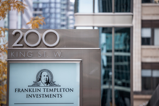 Picture of a sign with the logo of Franklin Templeton Investments facing their main office for Toronto, Ontario, Canada. Franklin Templeton Investments is a global anking and binvestment firm from the United States