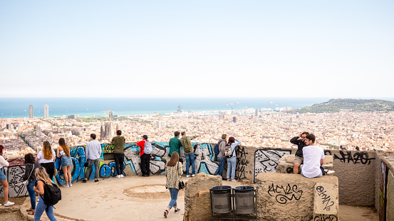 Barcelona, Spain. May 2019. People watching panorama view of Barcelona on Bunkers del Carmel