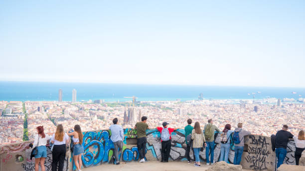 People watching panorama view of Barcelona on Bunkers del Carmel stock photo