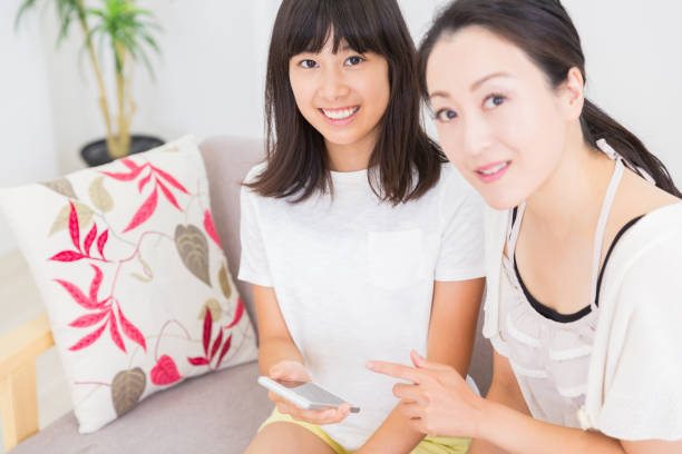 istock asian parent and daughter 1152527123