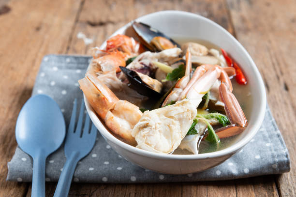 istock Spicy Seafood Soup on white dish , thai cuisine 1152531357