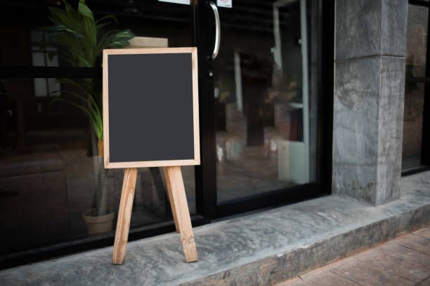 istock Blank black Chalk board in front of the cafe 1152536643