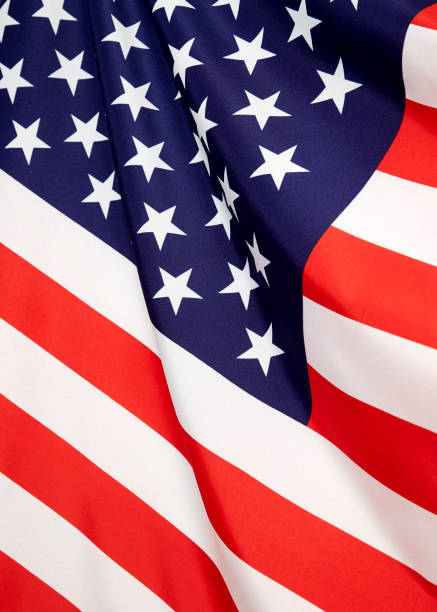 istock 4th of july independence day American flags white background 1152536949