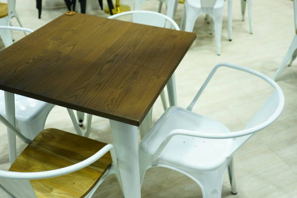 istock Coffee shop enterior with White wooden table 1152537096