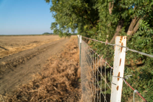 istock Metal fence post with wire 1152540375