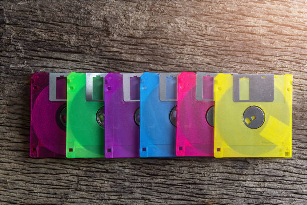 istock Floppy disks on a wooden table background. 1152546183