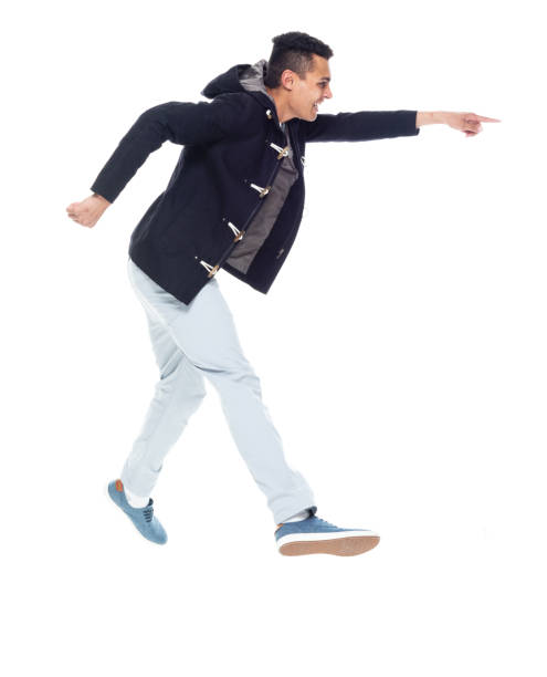 istock Very handsome tall black man dressed in trendy clothes - side view and pointing 1152547645
