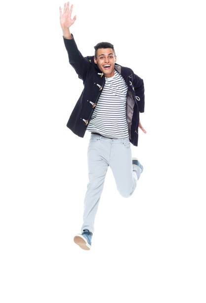 istock Very handsome tall black man dressed in trendy clothes - jumping with excitement 1152547781
