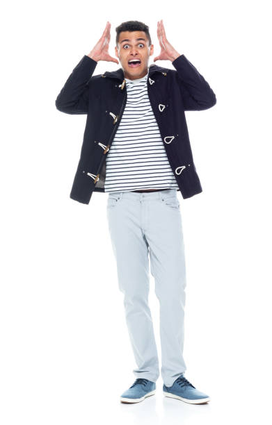 istock Handsome tall black man in nice clothes on white background - confusion 1152547808