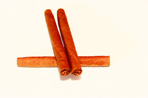 Natural cigarillo isolated on the white background