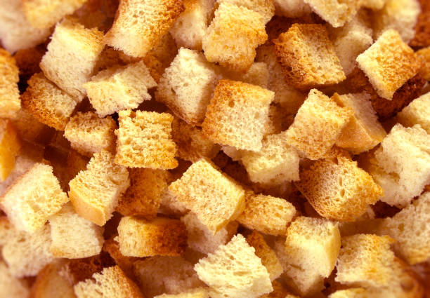 istock Fried croutons close up background 1152556119