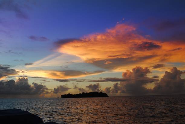 istock Tropical island sunset photos 1152559837