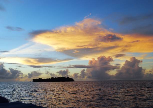 istock Tropical island sunset photos 1152559842