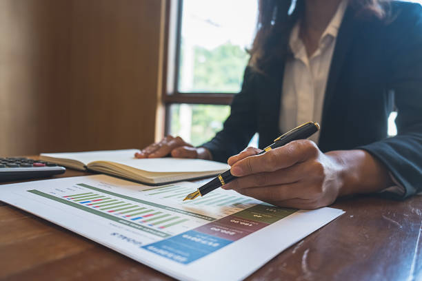 istock Business team brainstorming and discussing with financial data and report graph. Teamwork meeting working concept. 1152559908