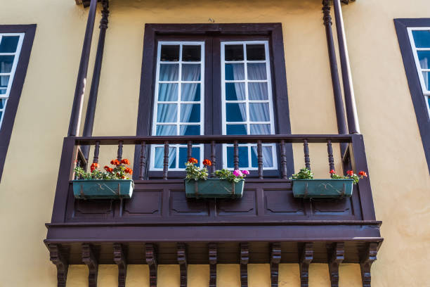 istock Wooden Spanish balcony with flowers 1152563818