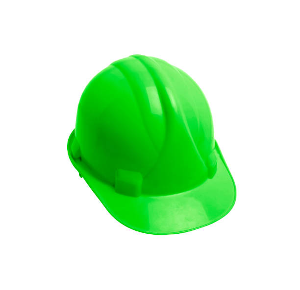istock Green builder's helmet isolated on white background 1152564785