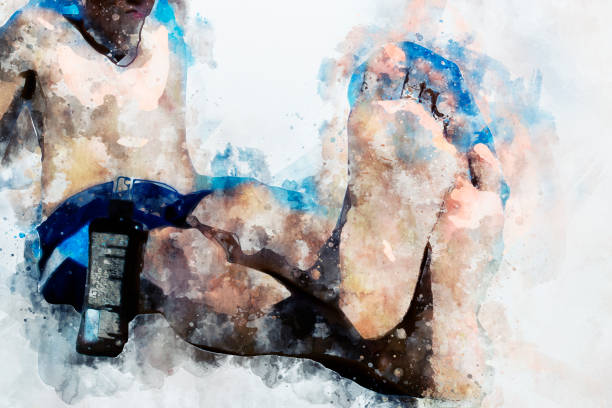 istock Man sitting on beach with bottle of sunscreen lotion 1152565779