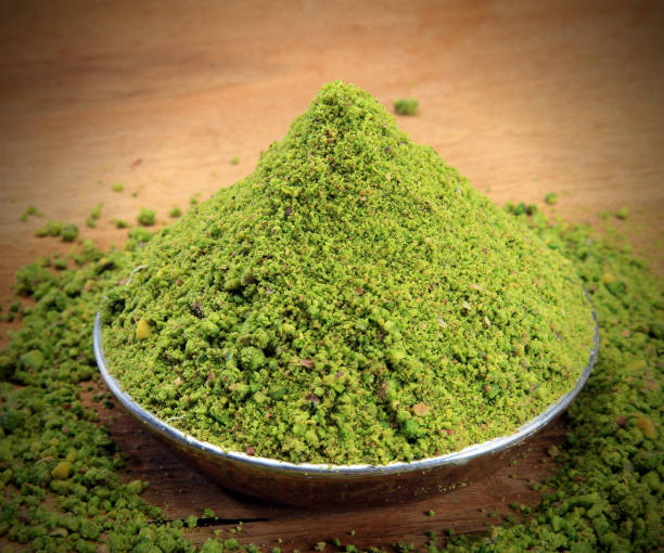 green pistachio powder green pistachio powder finely stock pictures, royalty-free photos & images