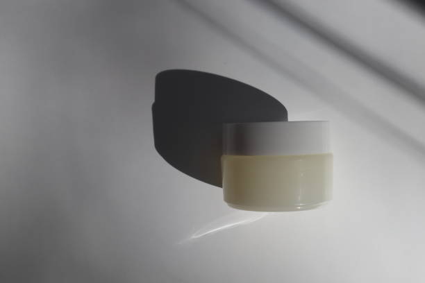 istock White plastic tube with round cap on white background with shadows. Front view for your design. facial cosmetic products. Spa concept. Beauty blogger, salon treatments concept. 1152567553