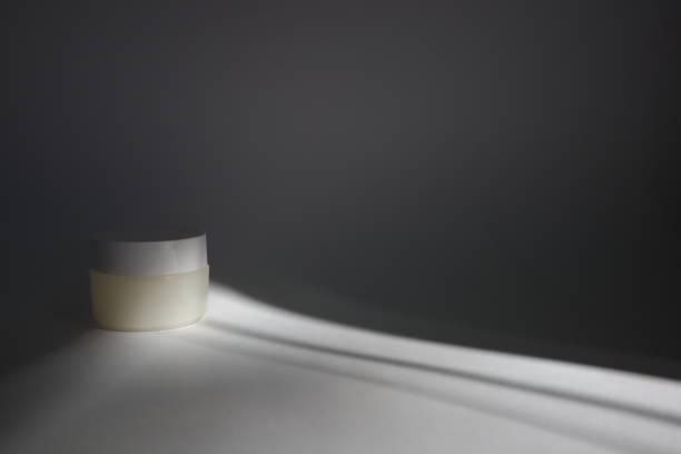 istock White plastic tube with round cap on white background with shadows. Front view for your design. facial cosmetic products. Spa concept. Beauty blogger, salon treatments concept. 1152567556
