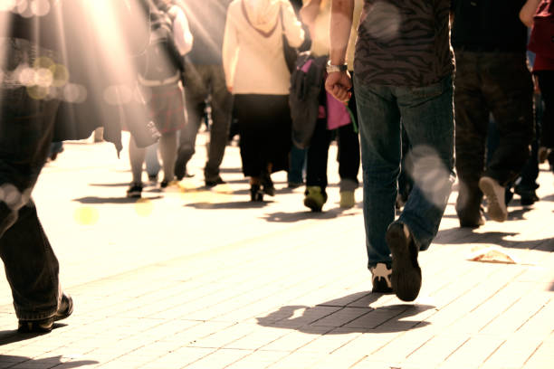 istock close up crowded people walking on busy street 1152567735