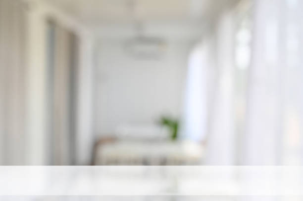istock Empty table with montage in living room background. 1152567892