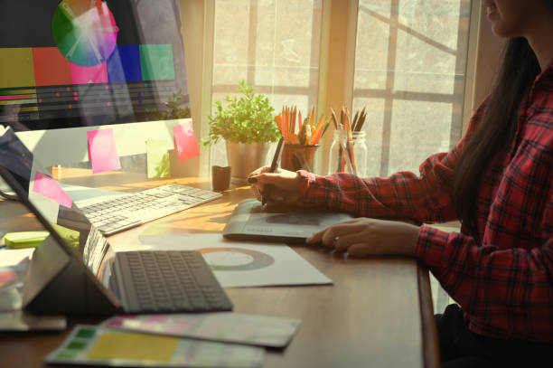 istock Graphic designer Woman working with digital pen and tablet on creative workspace, Vintage tone. 1152568497