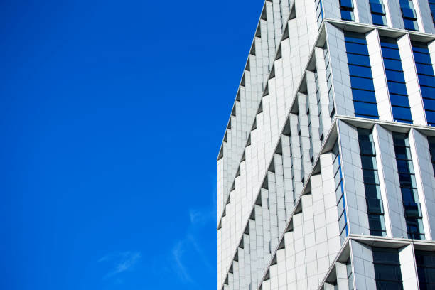 istock Office building in the blue sky 1152570175