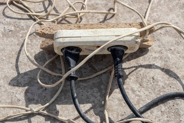 istock Excessive extension on power outlet, very dangerous 1152570523
