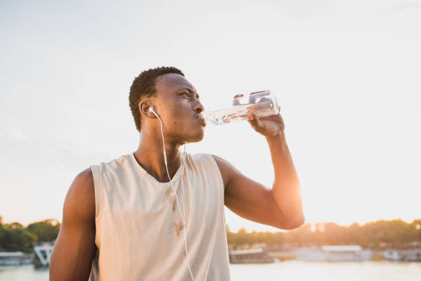 istock African American athlete resting after training outdoors 1152570578