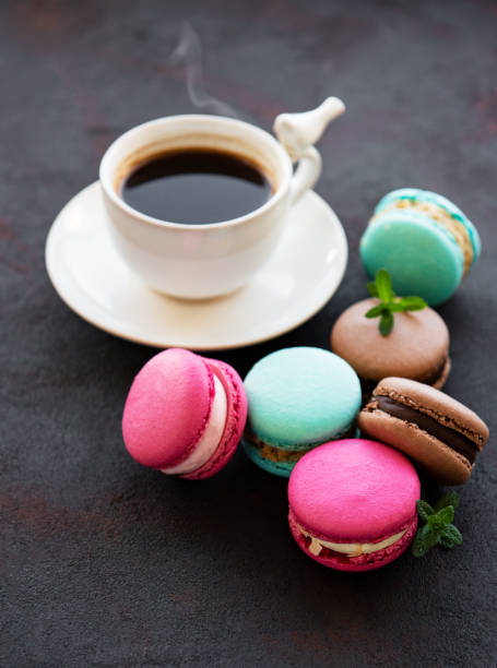 istock Cup of coffee and macaroons 1152571181