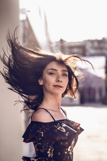 istock Young Woman's Portrait in Windy Weather 1152576029