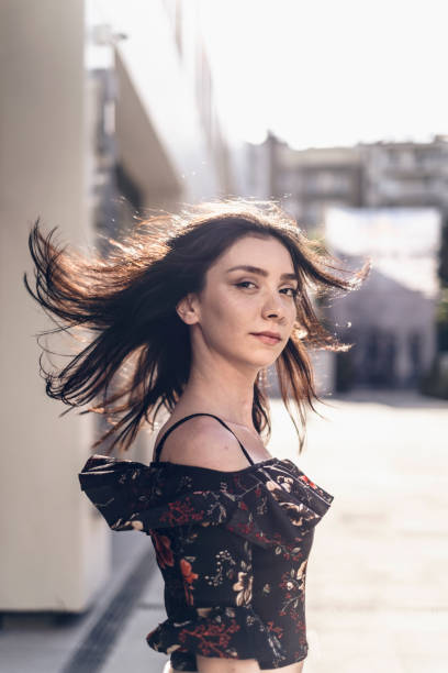 istock Young Woman's Portrait in Windy Weather 1152576626