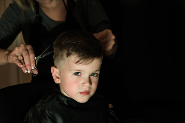 istock Cutting hair with electric razor 1152580319