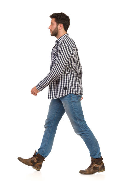 istock Walking Man In Lumberjack Shirt, Jeans And Boots 1152585810
