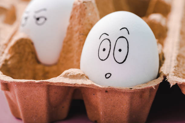 istock selective focus of egg with surprised face expression in egg carton 1152587722