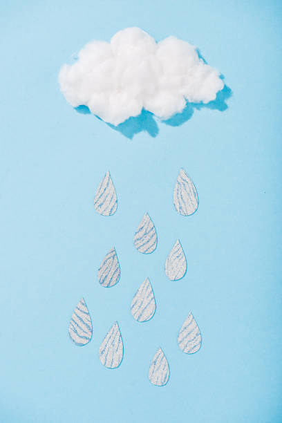 istock top view of cotton candy cloud with glitter raindrops on blue 1152587776