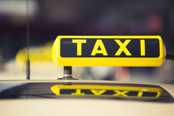 istock Taxi Sign on a Car Roof 1152588799