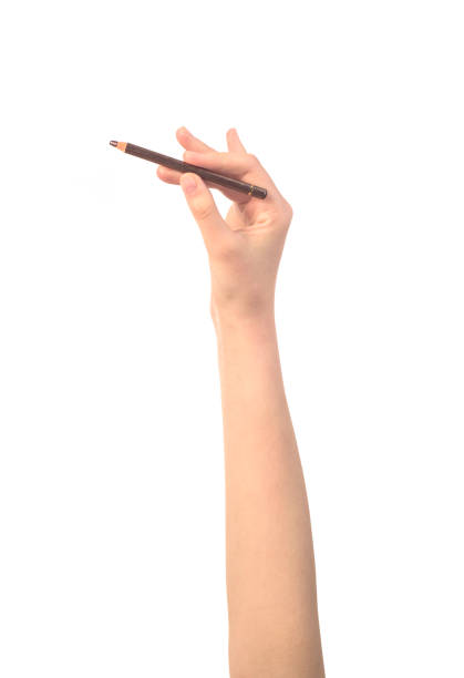istock make up pencil in womens hand isolated 1152589105