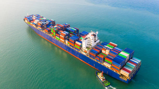 istock Container ship sailing through the ocean, Business logistics and transportation of International container ship in the ocean freight transportation. 1152592525