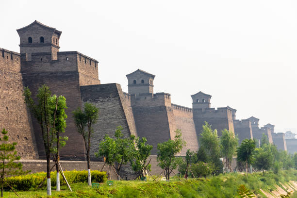 The ancient walls protecting the Old city of Pingyao, China The ancient walls protecting the Old city of Pingyao, Shanxi province, China ancient chinese weapons stock pictures, royalty-free photos & images