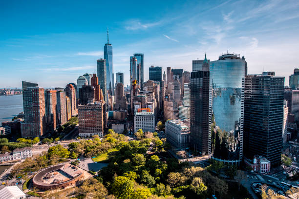 Aerial image of a Battery Park in Downtown Manhattan taken at golden hour Helicopter view of a Battery Park and a Castle Clinton National Monument in Downtown Manhattan taken at golden hour. new york city built structure building exterior aerial view stock pictures, royalty-free photos & images