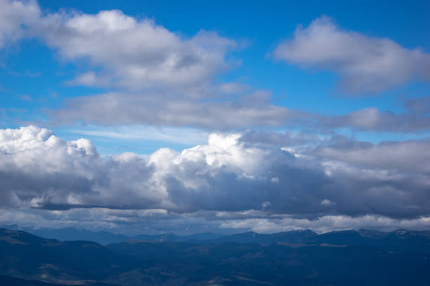istock Cumulus over the mountains 1152594120