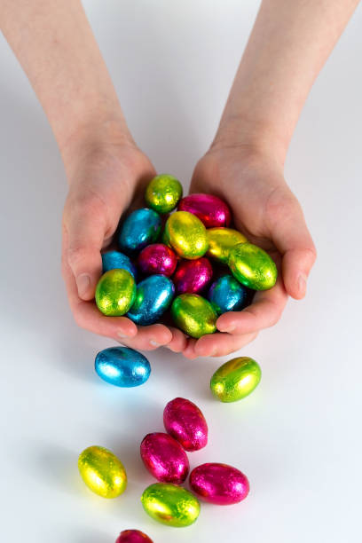 Holding Easter Eggs stock photo