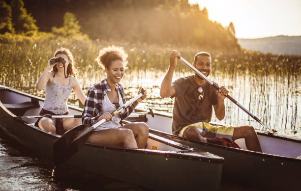 istock Friends Canoeing on The Lake 1152595309