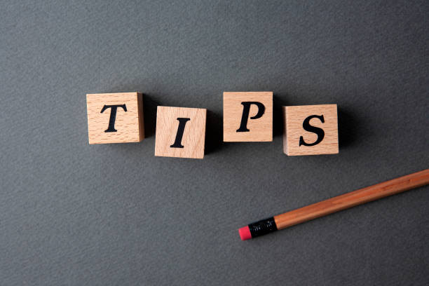 istock tips word written in wooden cubes 1152595657