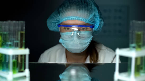 istock Upset lab worker in protective glasses and uniform after faulty experiment 1152598506