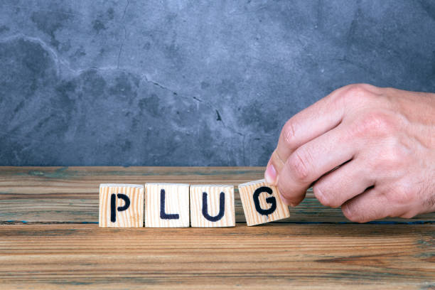 istock Plug - word from wooden letters 1152600080