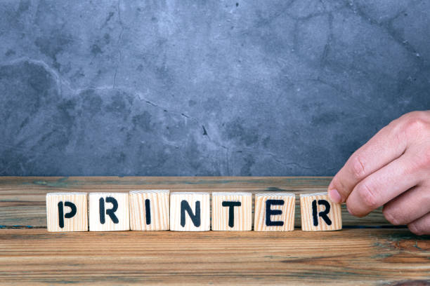 istock Printer - word from wooden letters 1152600263